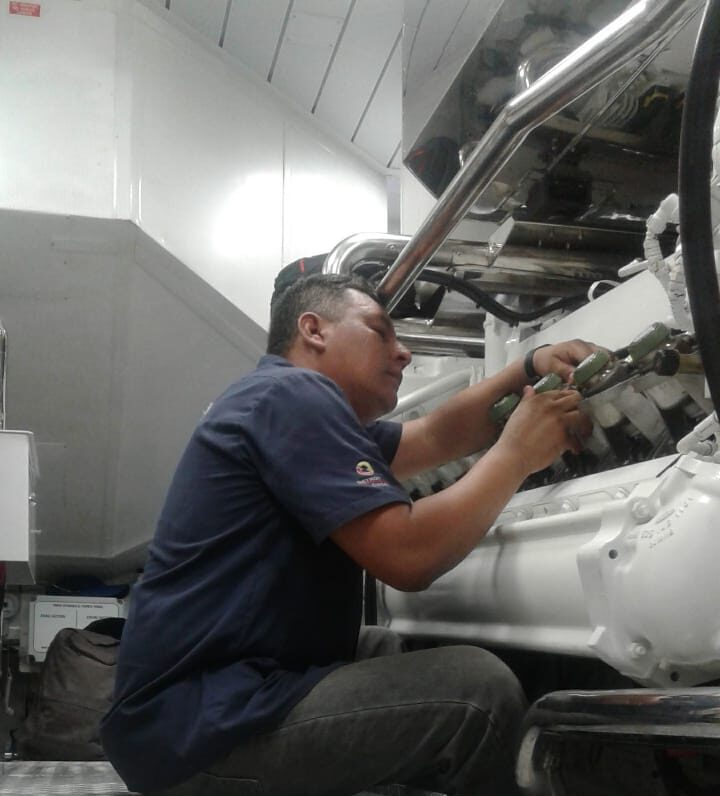 Diesel Premier marine technician performing engine service